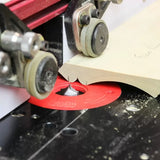 Woodworking router table cutting decorative edge on wood with router bit and fence