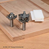 1/4 inch tongue and groove router bit set for woodworking on a wooden surface