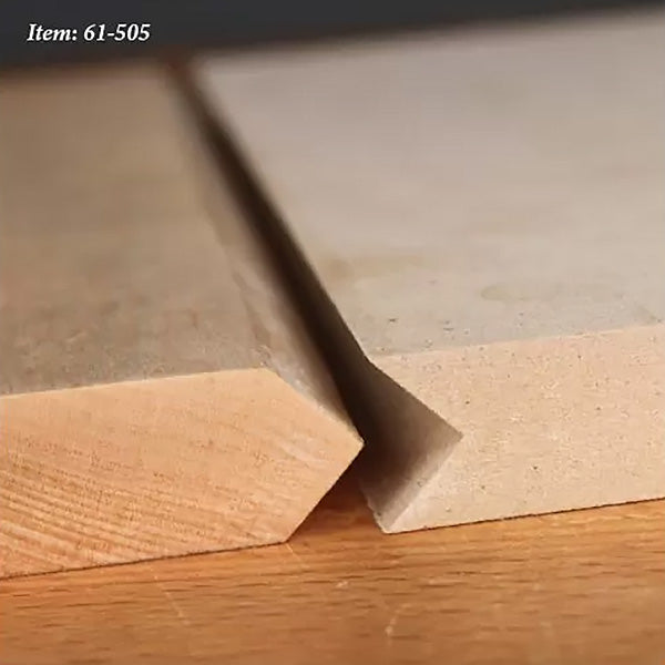 Close-up of two wooden boards with precise 45-degree chamfered edges for woodworking projects.