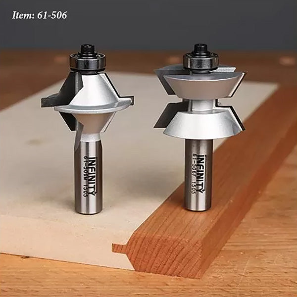 Two woodworking router bits with bearings on a wooden work surface, item 61-506.
