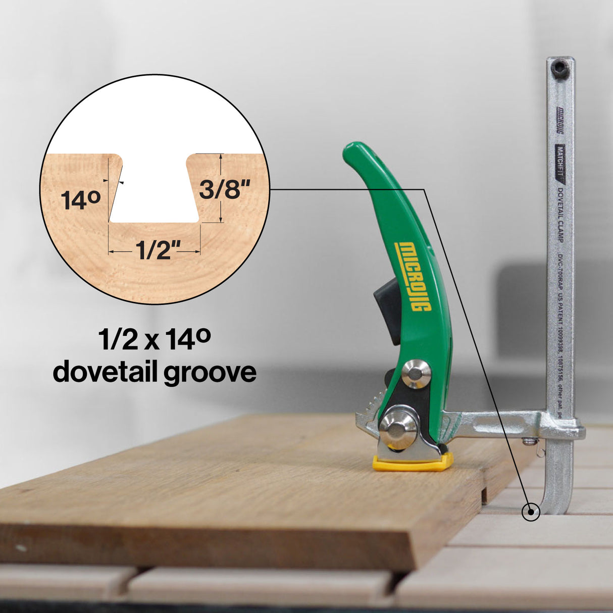 Dovetail clamp securing wood with 1/2 x 14° dovetail groove diagram for woodworking.