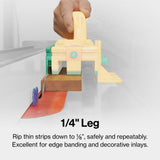 Push block guiding wood through table saw for precise thin wood strip cutting, woodworking safety tool