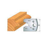 Woodworking molding cutter head with profile diagram and measurements for precision cutting