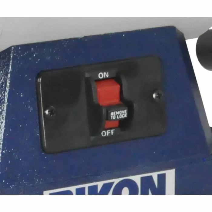 Red and black power switch with on off safety lock on a blue woodworking tool machine