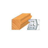 Woodworking molding profile cutter next to routed wood with groove and radius measurements.