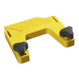 Yellow magnetic woodworking featherboard with black adjustment knobs for table saws and router tables