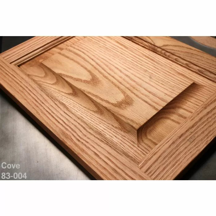 Woodworking sample with a cove cut detail on a panel using precision cutting tools