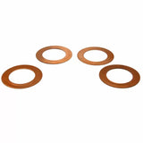 Set of four copper shims for woodworking tool adjustments, isolated on white background