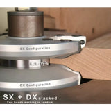 Stacked SX and DX router cutter heads shaping a wood edge for precision woodworking