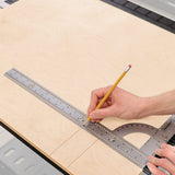 Marking a straight line along the Milescraft FrameSquare's ruler on a plywood panel
