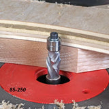Spiral flush trim router bit in use on router table with wood template for woodworking