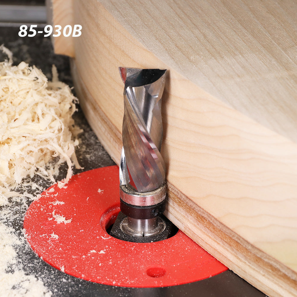Straight router bit trimming wood edge on router table with wood shavings and part number 85-930B visible.