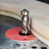 Carbide spiral router bit trimming wood edge on router table