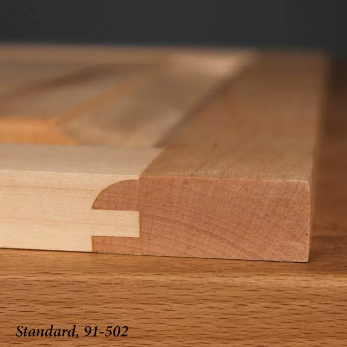 Close-up of interlocking hardwood rail and stile joint for woodworking projects