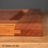 Close-up of a 15-degree Shaker style wood joint, showcasing precision joinery and smooth finish.