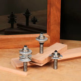 Table edge router bits for woodworking, displayed with wood boards and mirror reflection