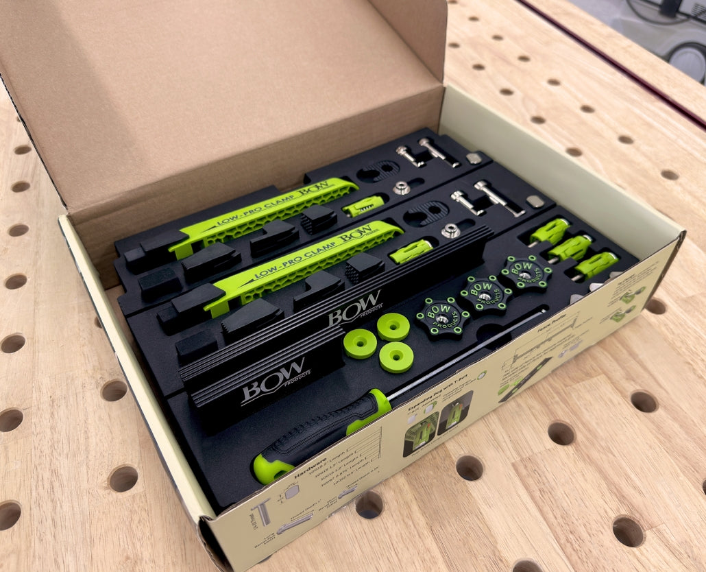 Bow Products low profile woodworking clamp kit in foam organizer on workbench