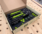 Bow Products low profile woodworking clamp kit in foam organizer on workbench
