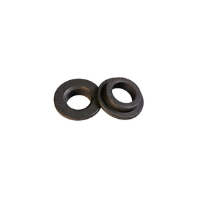 Pair of black saw blade bushings for woodworking tools on white background