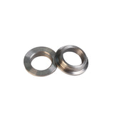 Pair of metal router table flange bushings for woodworking tools on white background