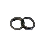 Two black plastic router table insert rings for woodworking dust collection