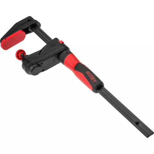 Gear clamp with red and black ergonomic handle for woodworking clamping applications