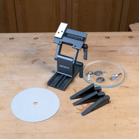 Drill press sharpening system on workbench.