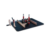 Precision woodworking router table with adjustable metal fence and red clamps