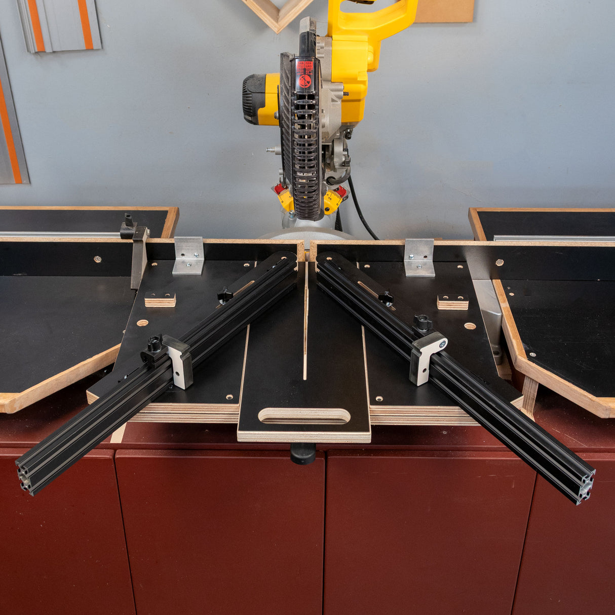 Easy Angle Miter Jig for woodworking, mounted on a miter saw workstation, ready for precision cuts
