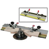 Woodworking coping sled jig with clamps on router table for precise joinery cuts