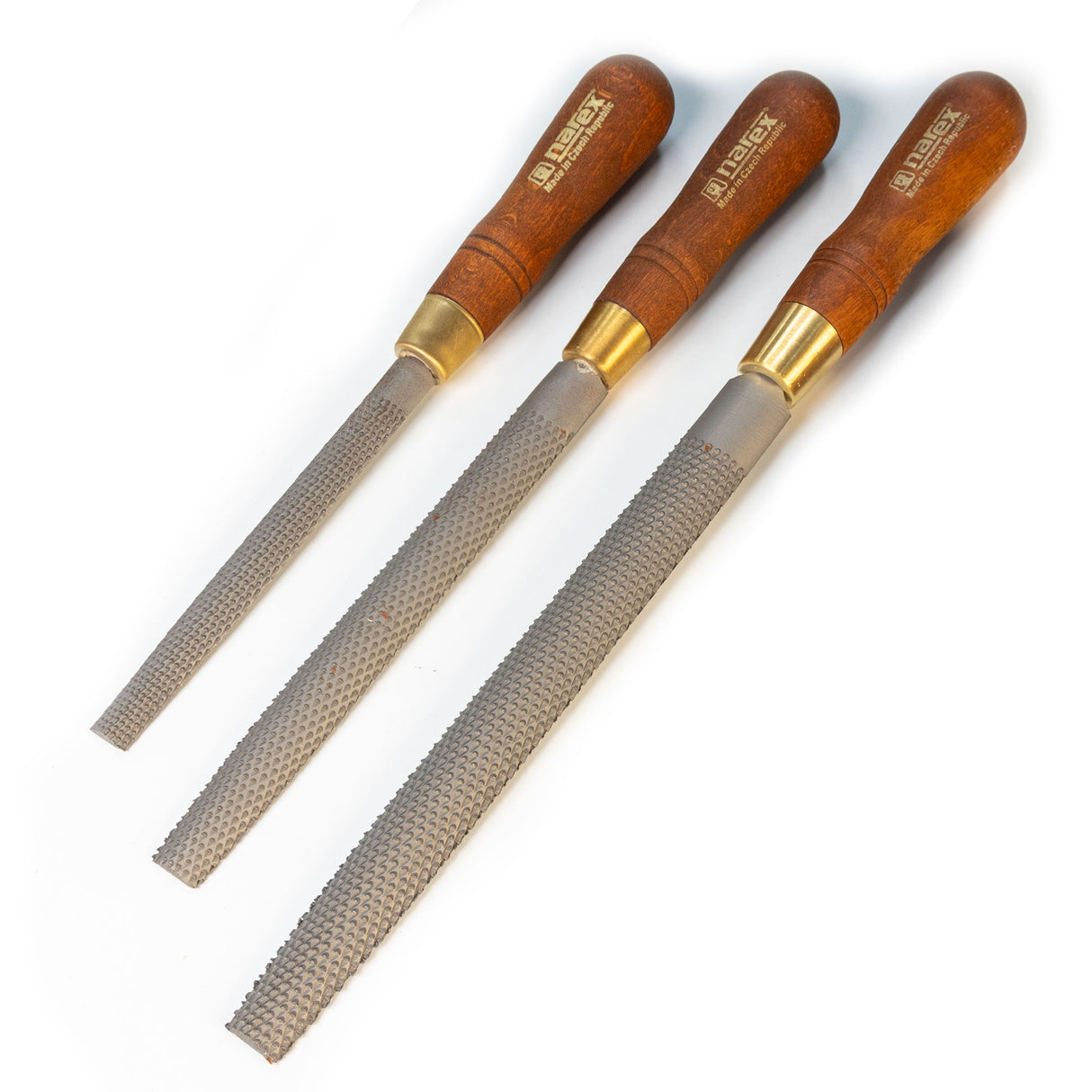 Set of three half round rasps with textured steel blades and wooden handles for woodworking.