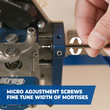 Hand using micro adjustment screw on woodworking jig to fine-tune mortise width