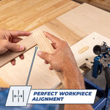 Hands aligning wooden pieces on woodworking jig for precise joinery