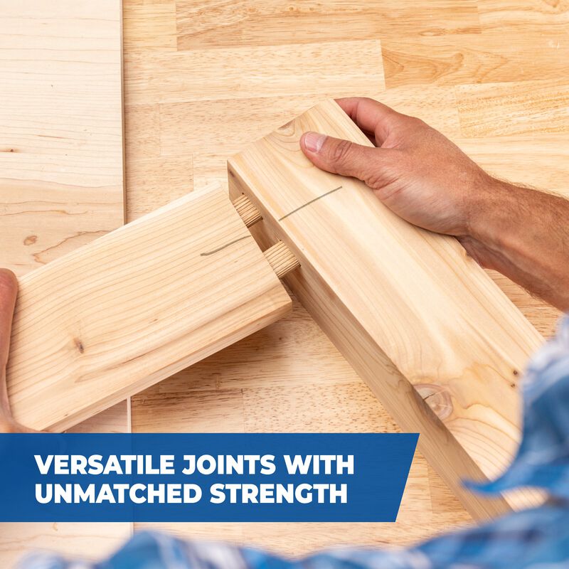 Hands assembling two pieces of light wood with dowel joints on a workbench, showing strong woodworking joint connection.
