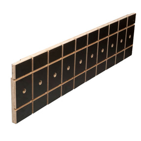 Woodworking table fence part with grid pattern and evenly spaced holes, isolated on white