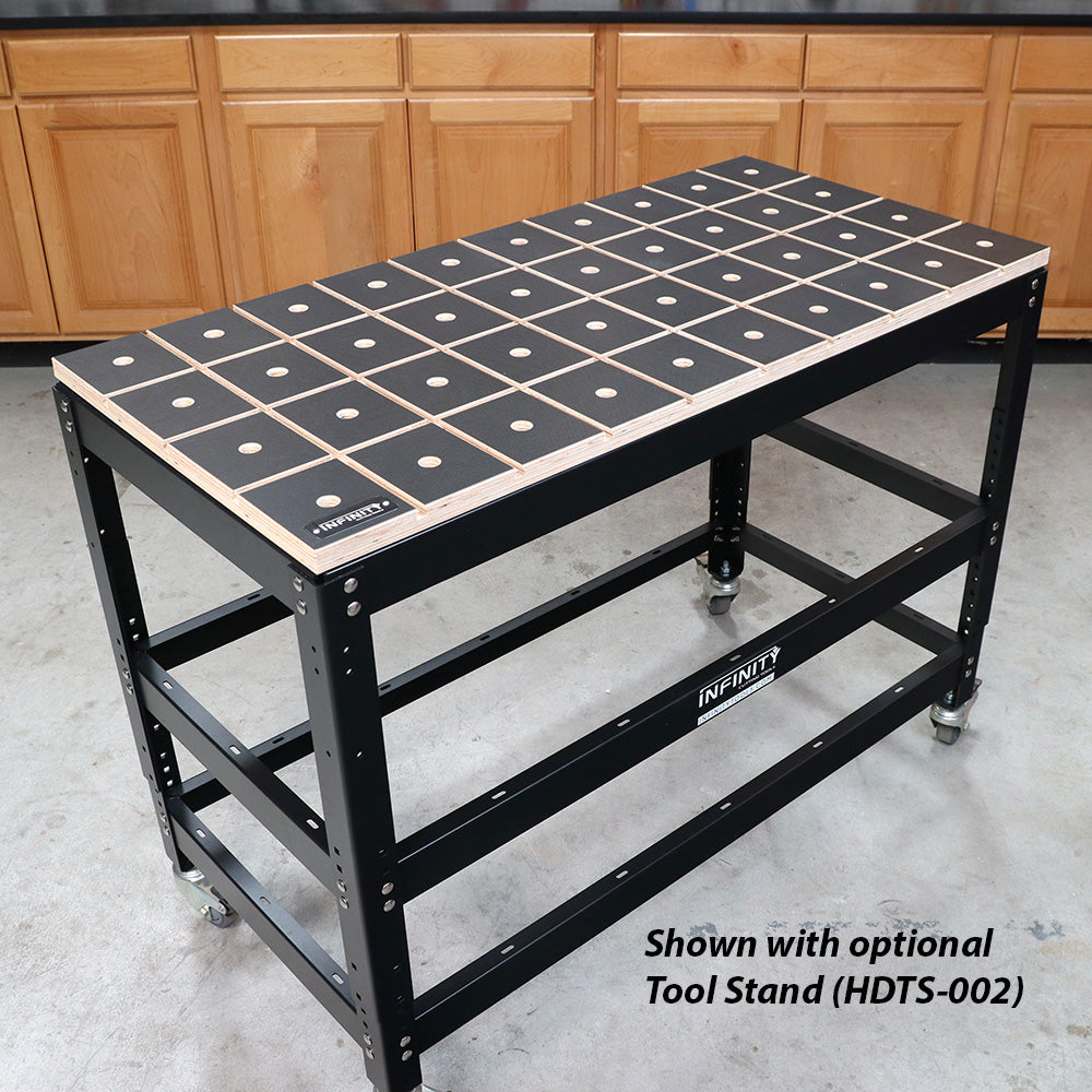 Heavy-duty woodworking workbench with grid-patterned tabletop and metal frame on casters
