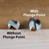 Comparison of two woodworking router bits, one with plunge point and one without, on wood surface.