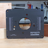 Router table insert plate for Triton MOF001 and TRA001, black metal with measurement markings