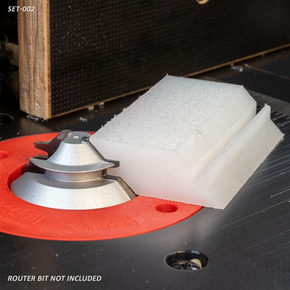 Router table setup with a large router bit and a white profile template, woodworking tool accessory