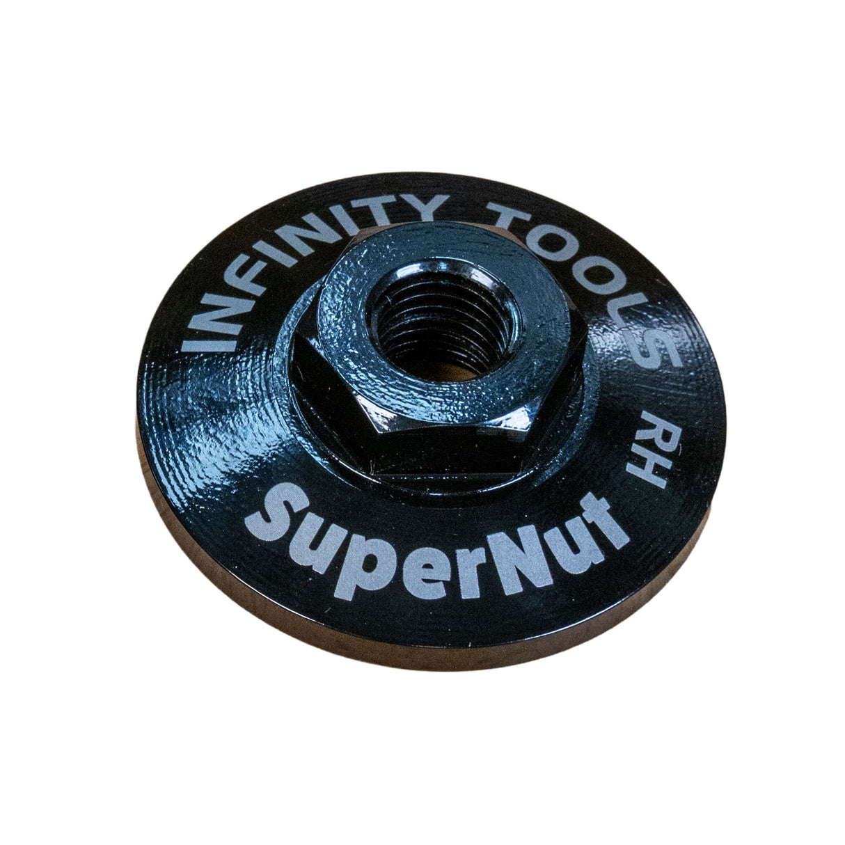 A black metal hex nut with a threaded hole in the center, featuring white printed text that reads 'INFINITY TOOLS' and 'SuperNut RH' on a plain white background.