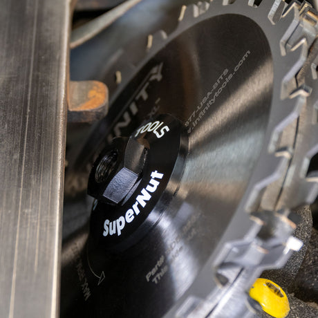 Close-up of SuperNut locking nut on circular saw blade for woodworking tools