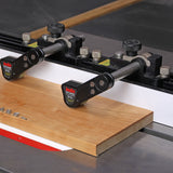Table saw featherboard jig securing wood for precise woodworking cuts