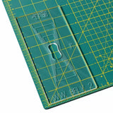 Acrylic woodworking template on green self-healing cutting mat with grid lines for precise measuring.