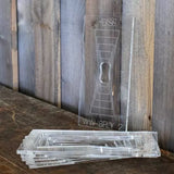 Clear acrylic butterfly key inlay template set on rustic wood surface, woodworking tool