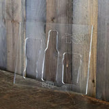 Clear acrylic beer bottle and can template for woodworking on rustic wood background