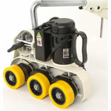 Woodworking power feeder with four yellow wheels and a black motor, ideal for router tables.