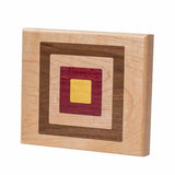 Wooden inlay panel with geometric square pattern in multiple wood tones