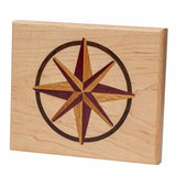 Wood inlay compass rose design on light square maple board, woodworking project example