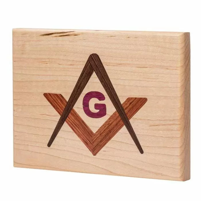 Wooden inlay plaque with geometric and letter G design, woodworking project display