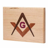 Wooden inlay plaque with geometric and letter G design, woodworking project display